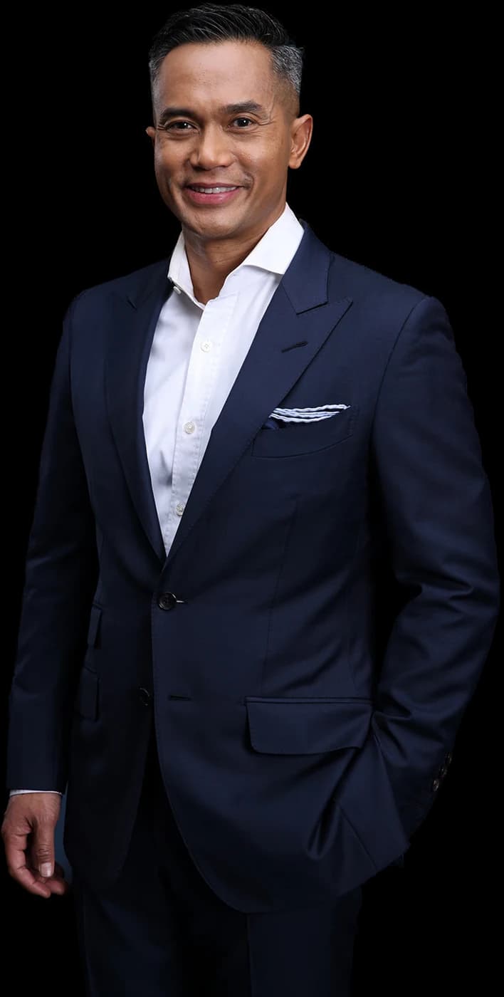 Anindya Bakrie in a navy suit